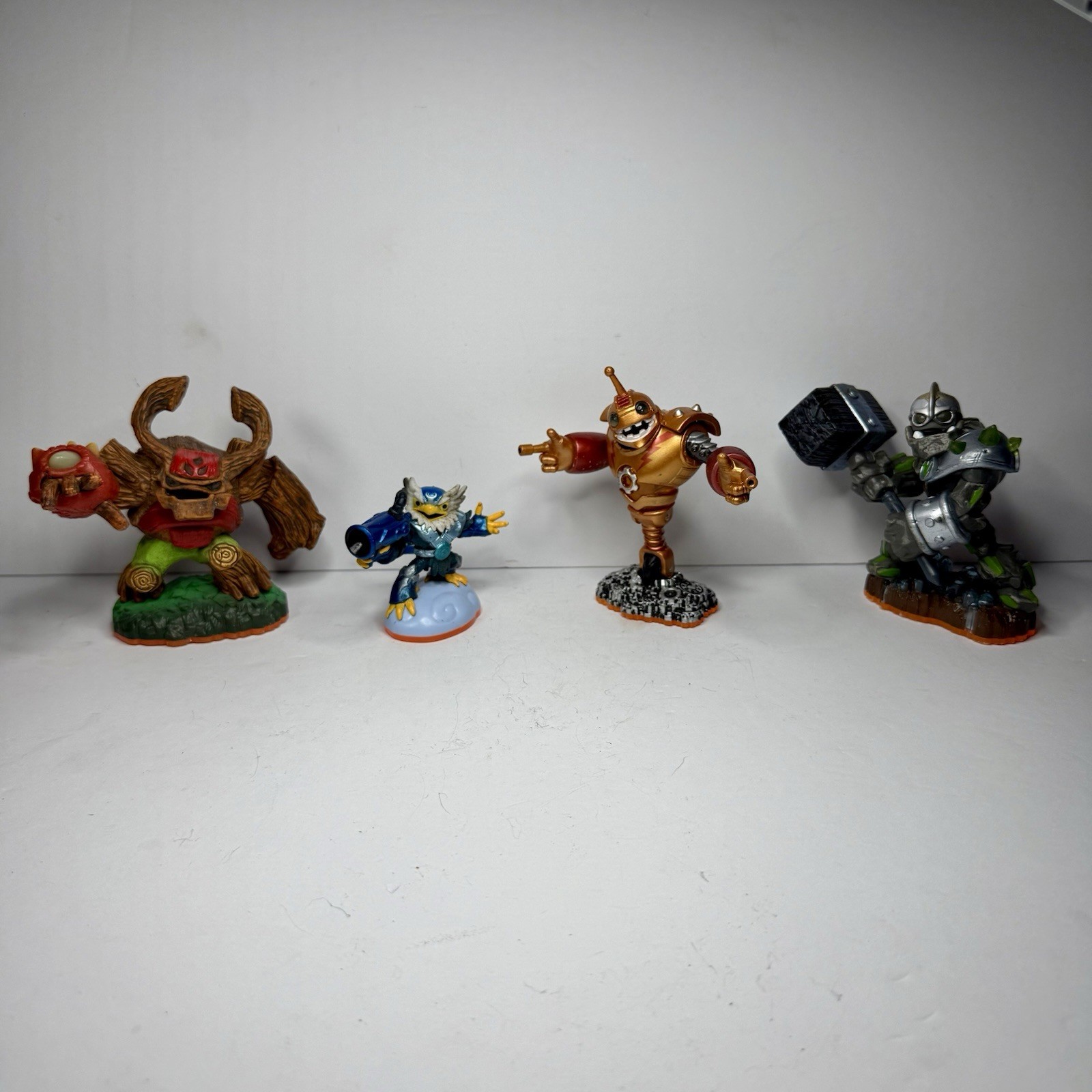 Skylanders Giants Figure Lot Of 4 – Bouncer Jet Vac Crusher Tree Rex