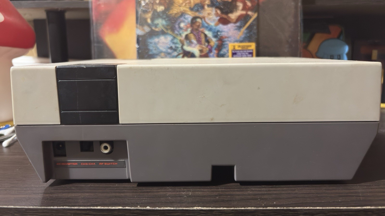 Nintendo entertainment System With Two Controller, Gun, And A Lot Of Games.