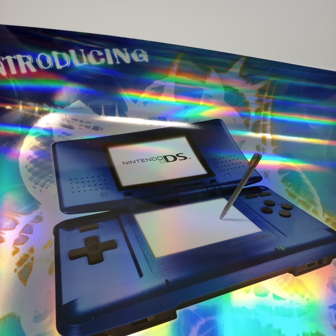2005 Nintendo DS Introducing Electric Blue Metallic Promo Poster 22″ X 28″ RARE!