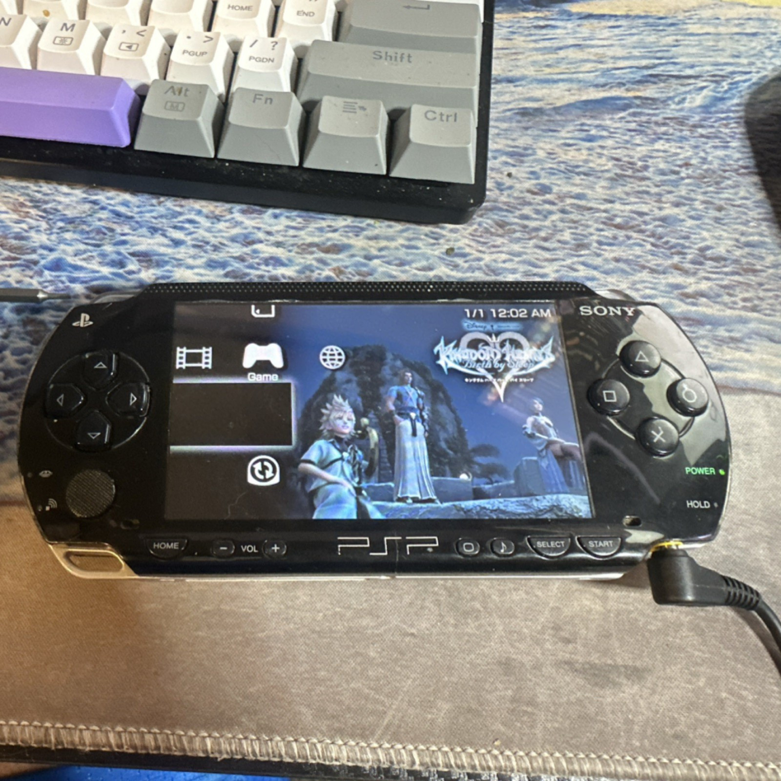 Sony PSP-1001 Handheld with charger and 2 batteries working READ