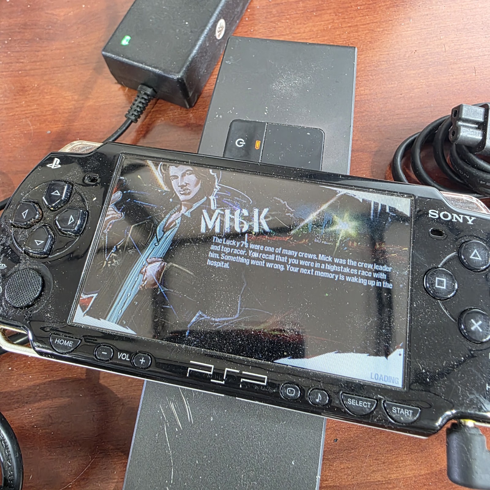 Sony PSP-2001 Slim Edition Black w/ Charger & Need For Speed Carbon – No Battery