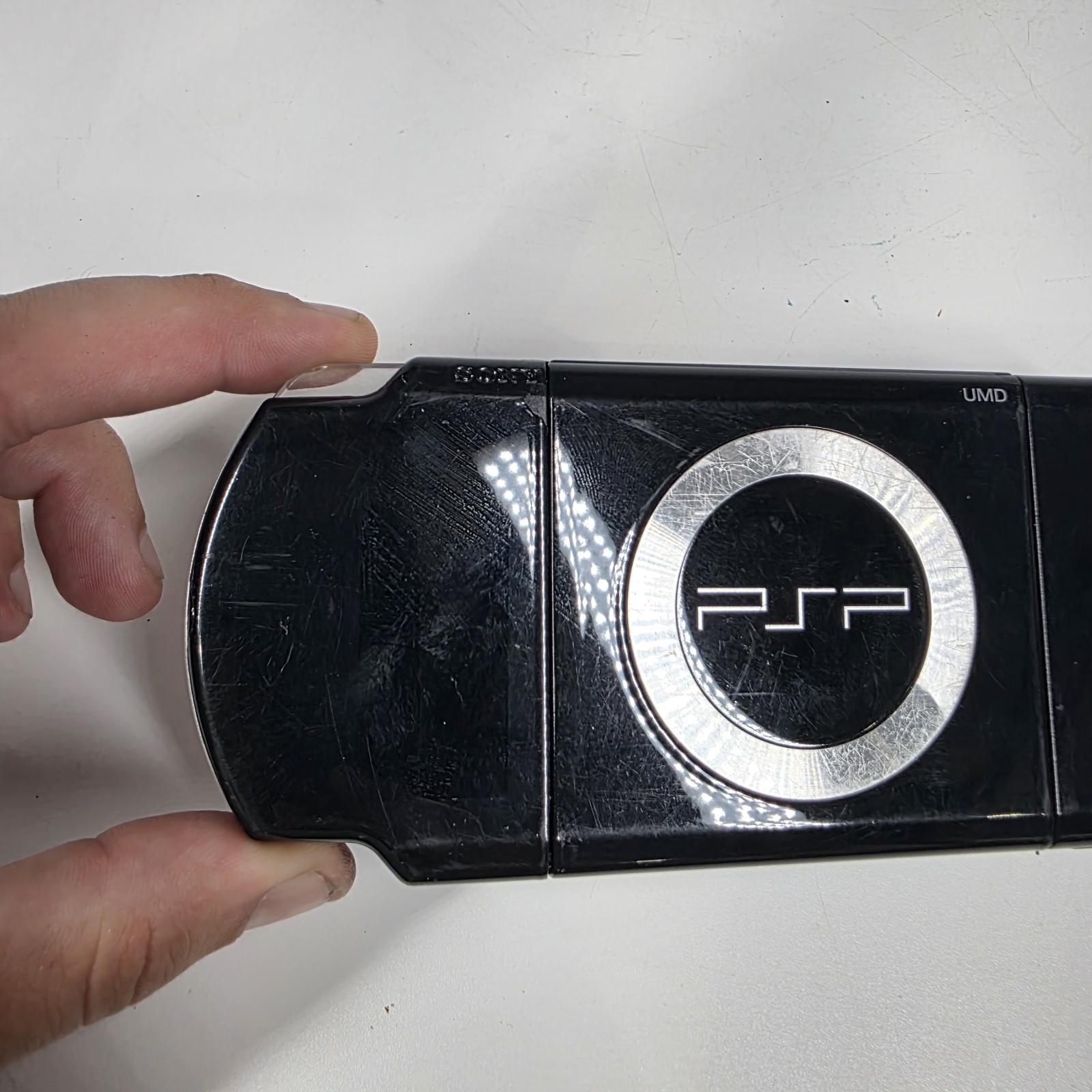 Sony PSP-2001 Slim Edition Black w/ Charger & Need For Speed Carbon – No Battery