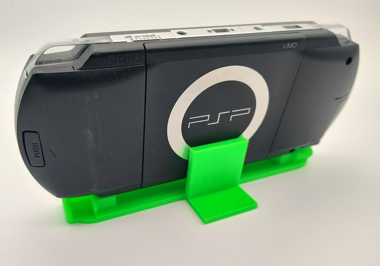 SONY PSP 1000 2000 3000 LOW PROFILE CHARGING DISPLAY STAND – Optional UMD Holder