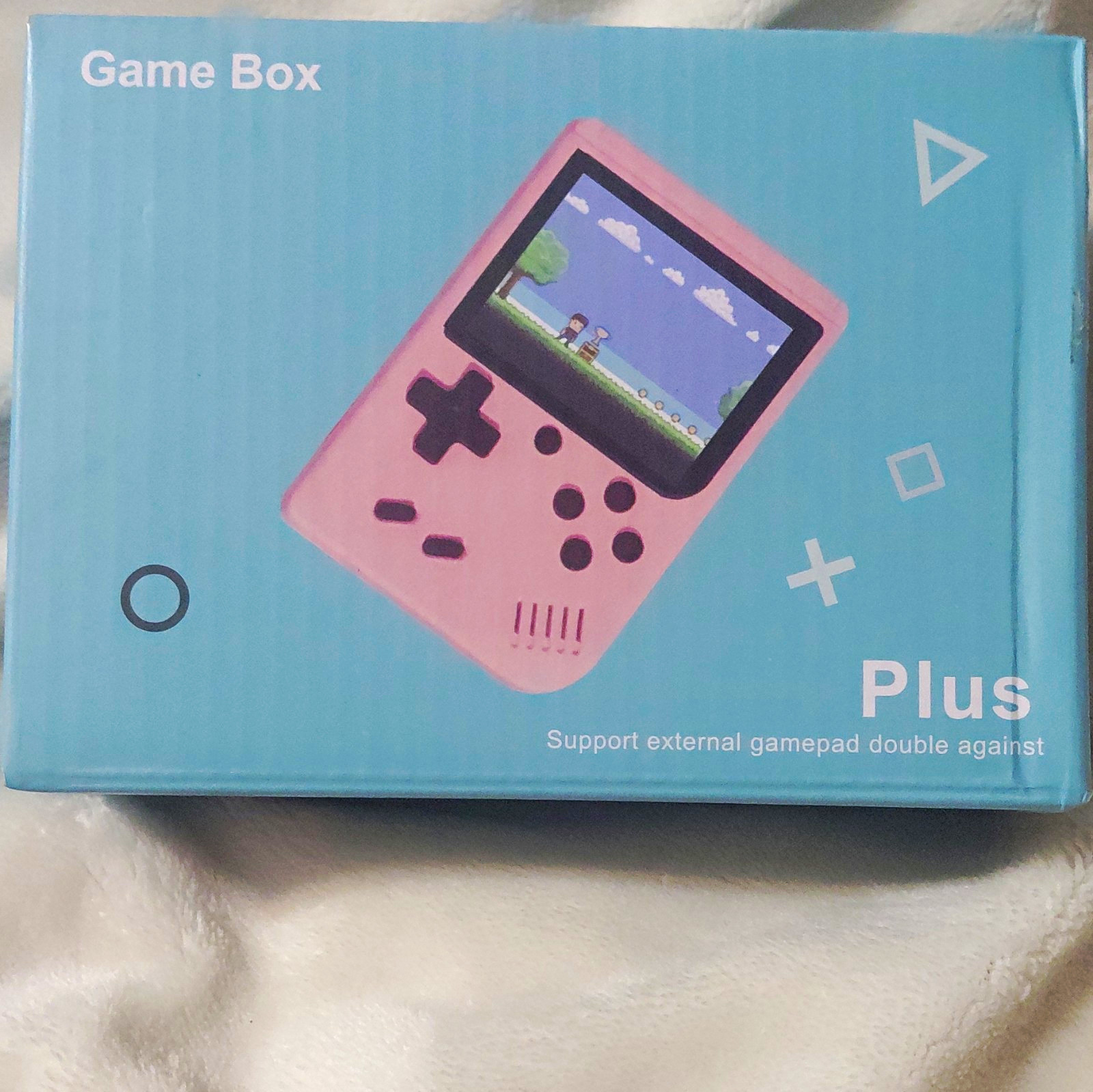 Game Box Plus Handheld System 3.0″ Backlit LCD, Rechargeable, Pink RCA