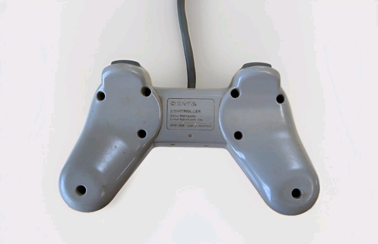 Sony PlayStation 1 Light Gray Controllers (x2) – Untested