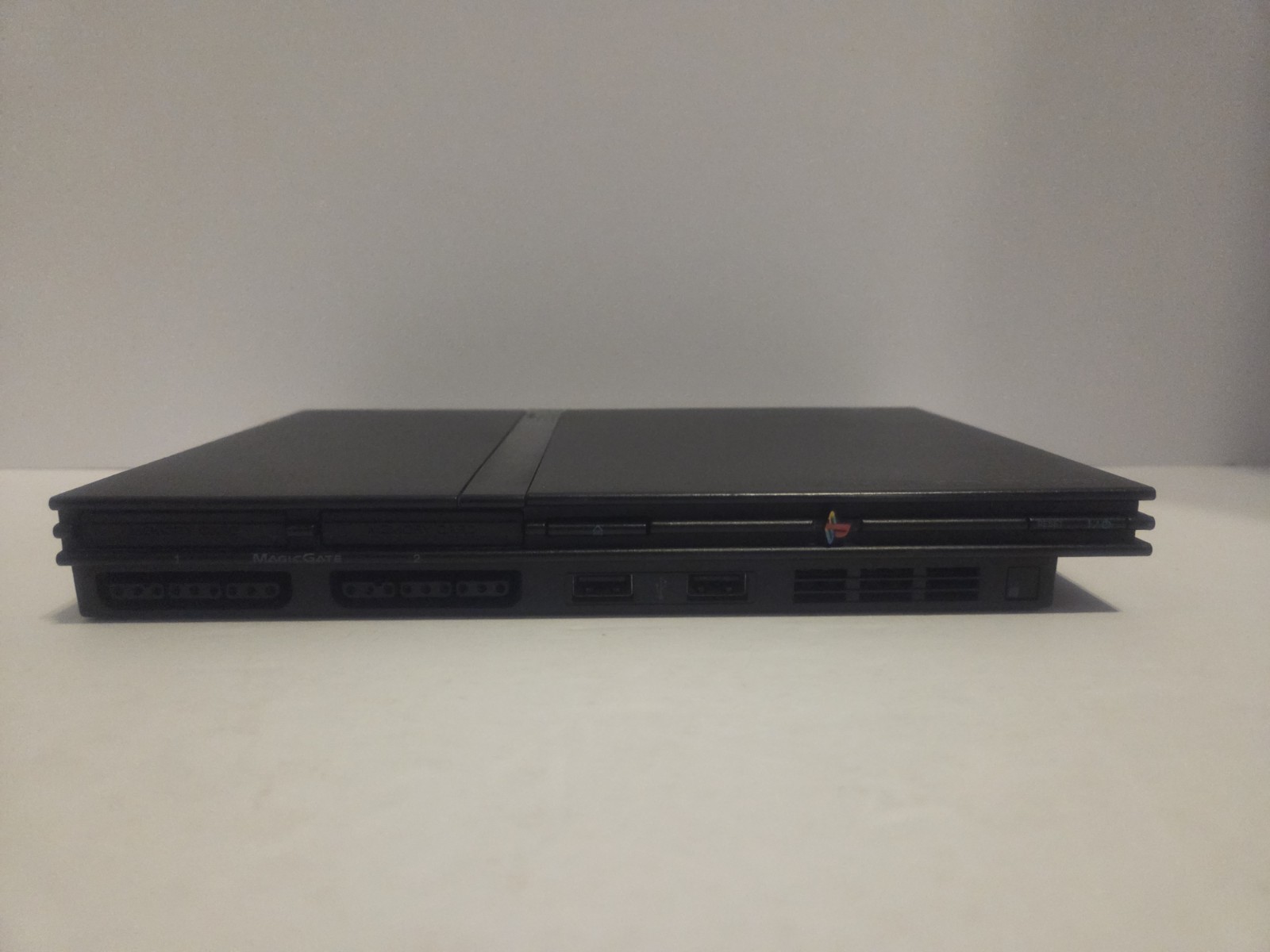 Sony PlayStation 2 Slim SCPH-70001 NTSC-U/C Bundle w/ Controller, Cables, Games
