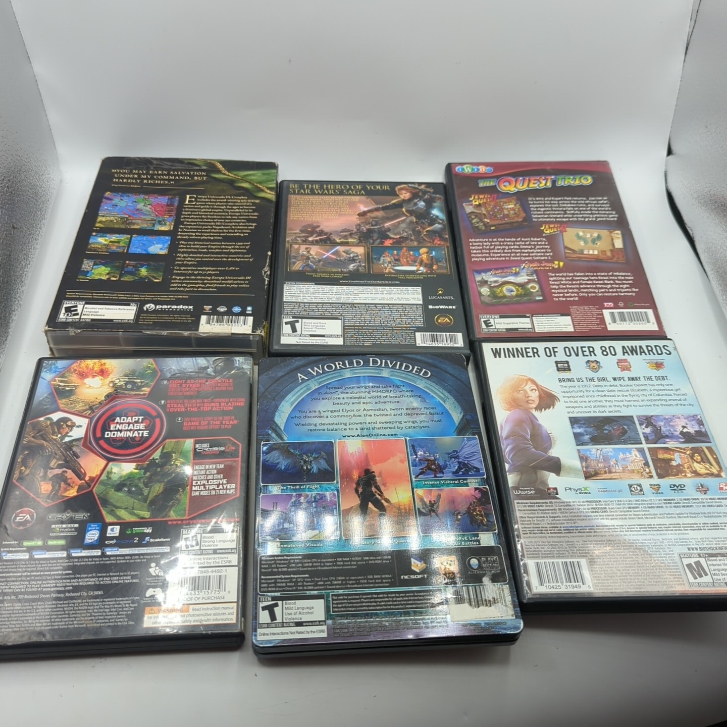 22 PC Videogame Lot Crysis, Lotr, BioShock, Prince Of Persia, AION, Dirt, & More