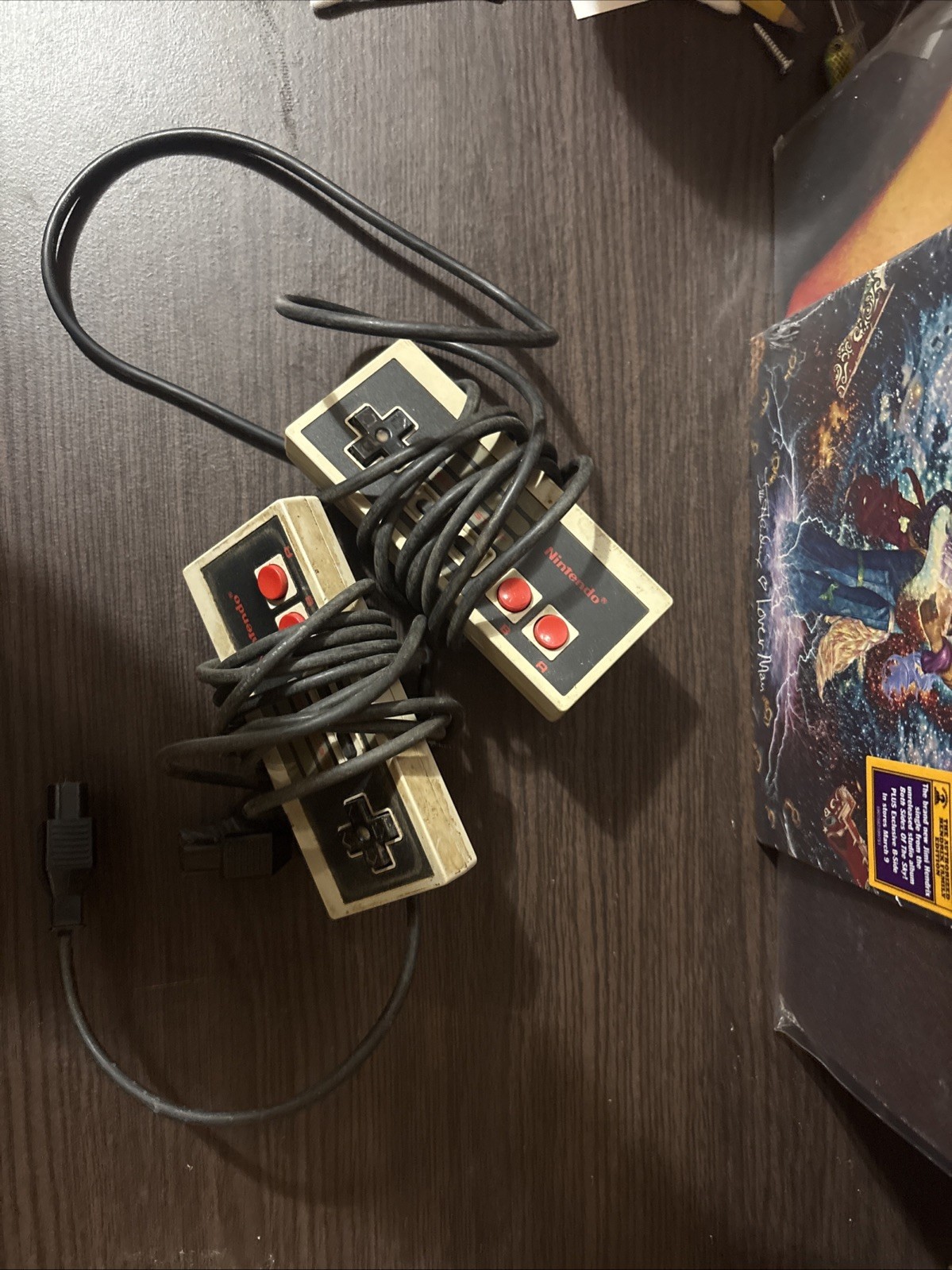 Nintendo entertainment System With Two Controller, Gun, And A Lot Of Games.