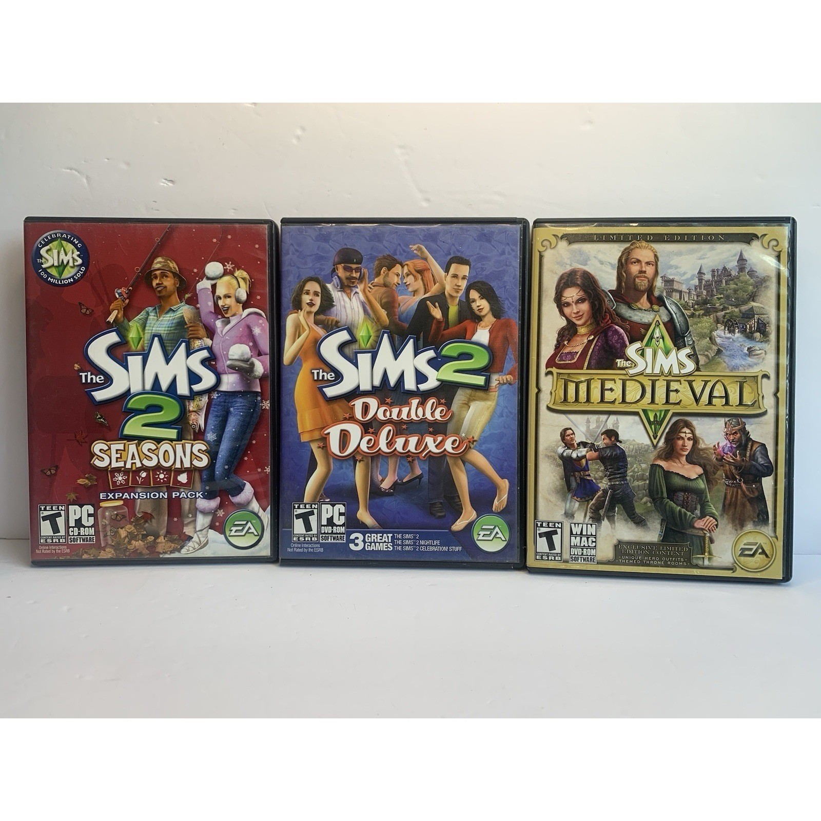 The Sims 2 Double Deluxe Seasons and The Sims Medieval Limited Edition PC Game