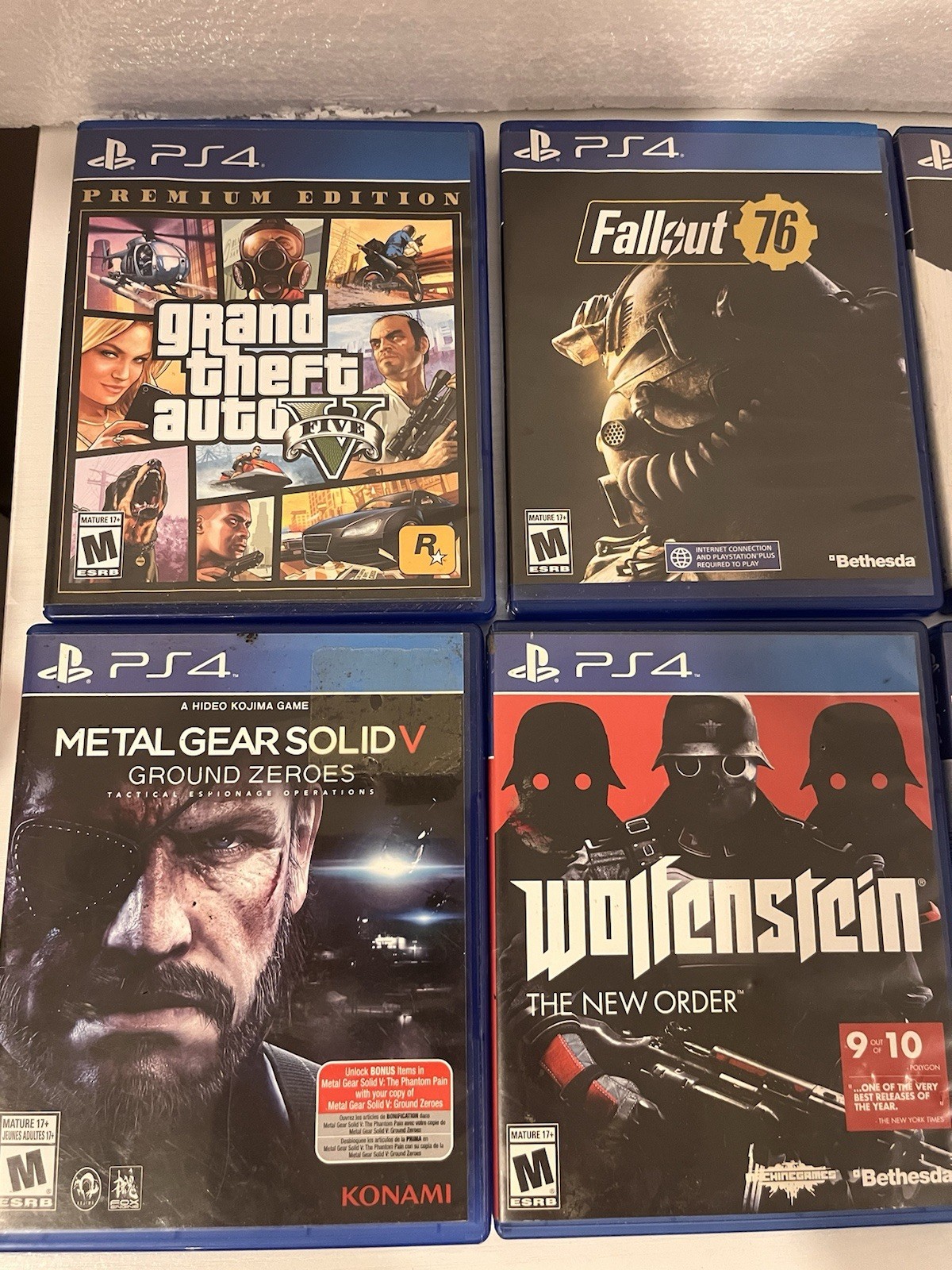 PS4 Game Lot of 8 – GTA V Premium, Fallout 76, Battlefield 4, Need for Speed