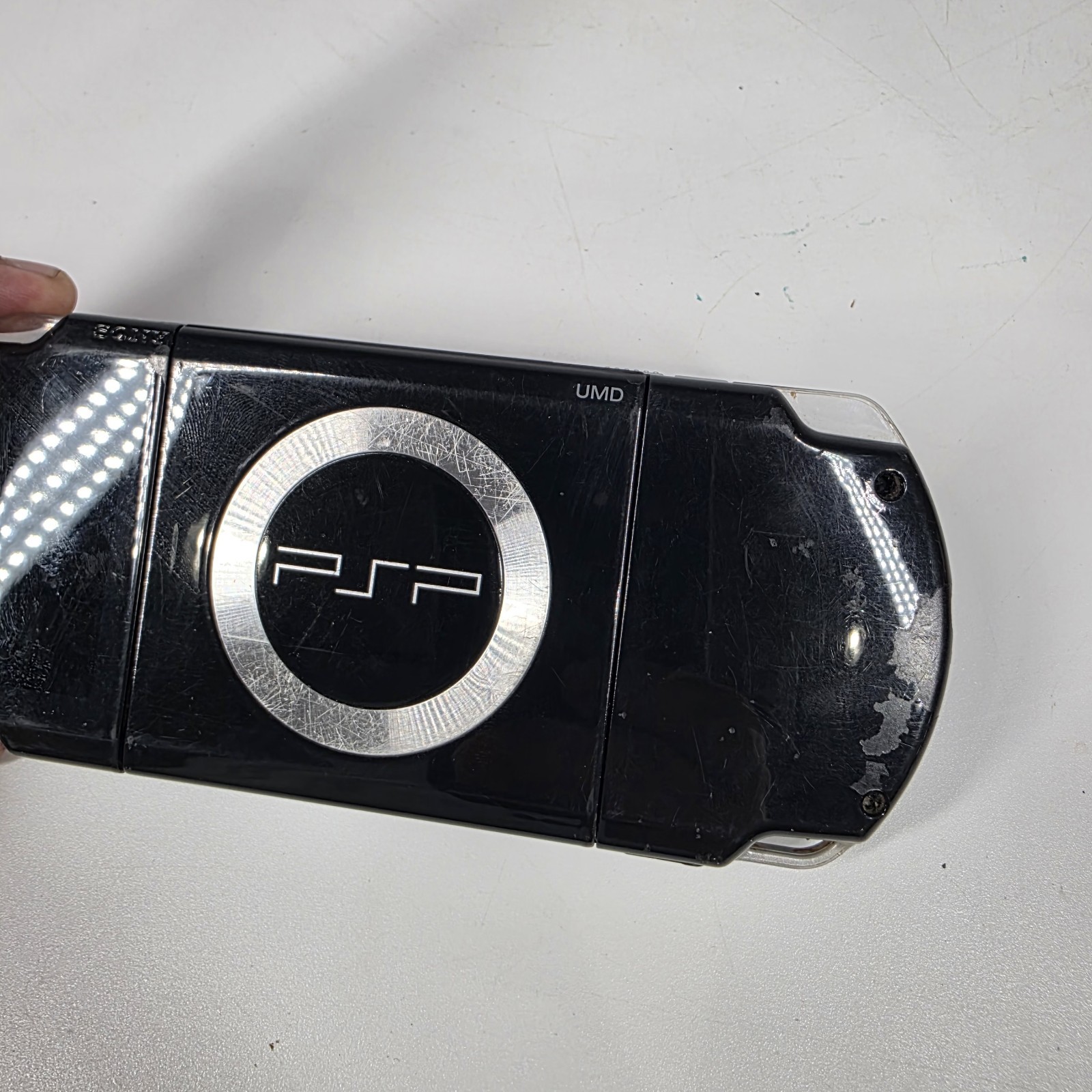 Sony PSP-2001 Slim Edition Black w/ Charger & Need For Speed Carbon – No Battery