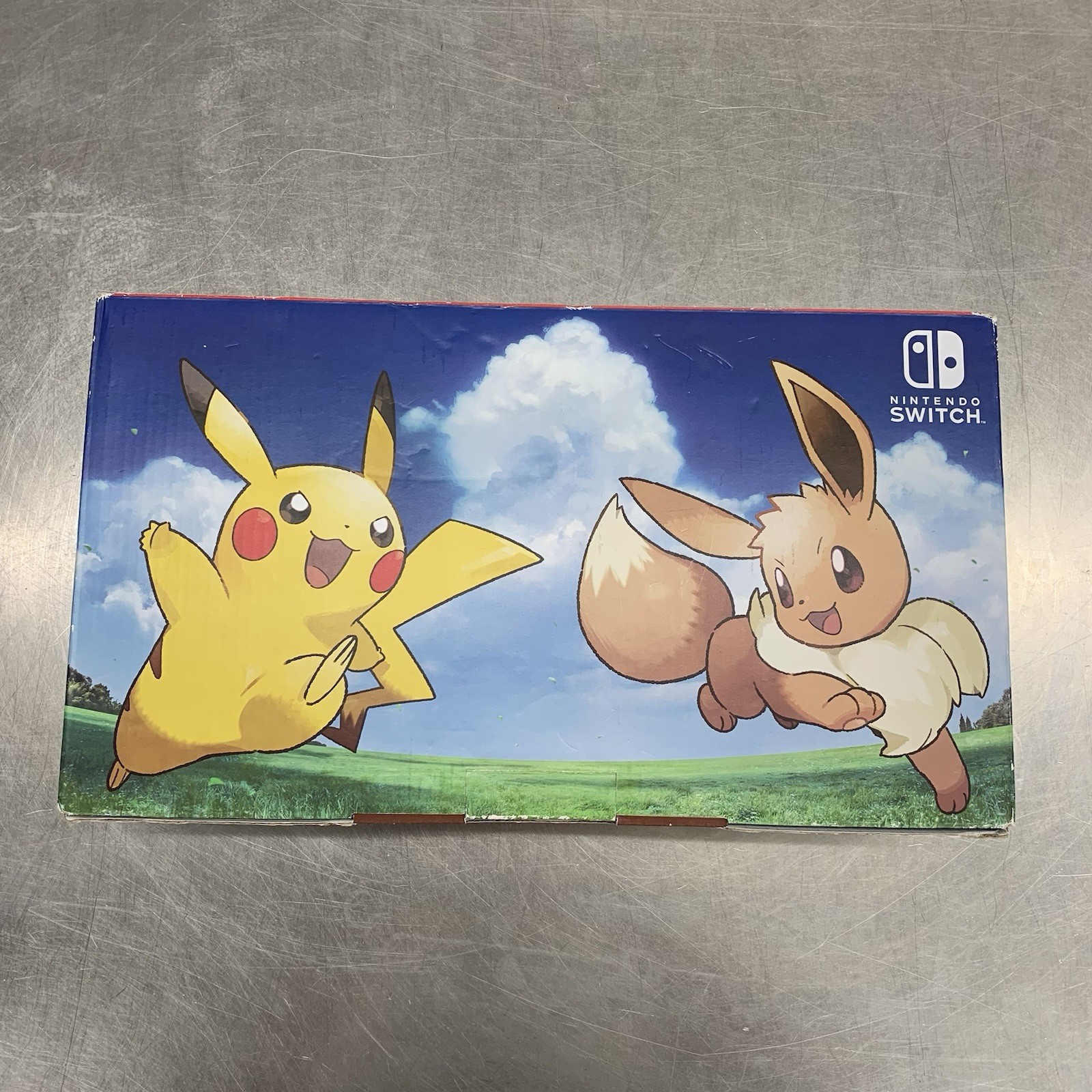 Nintendo Switch Pokémon Let’s Go Pikachu Edition in Box 32GB Console