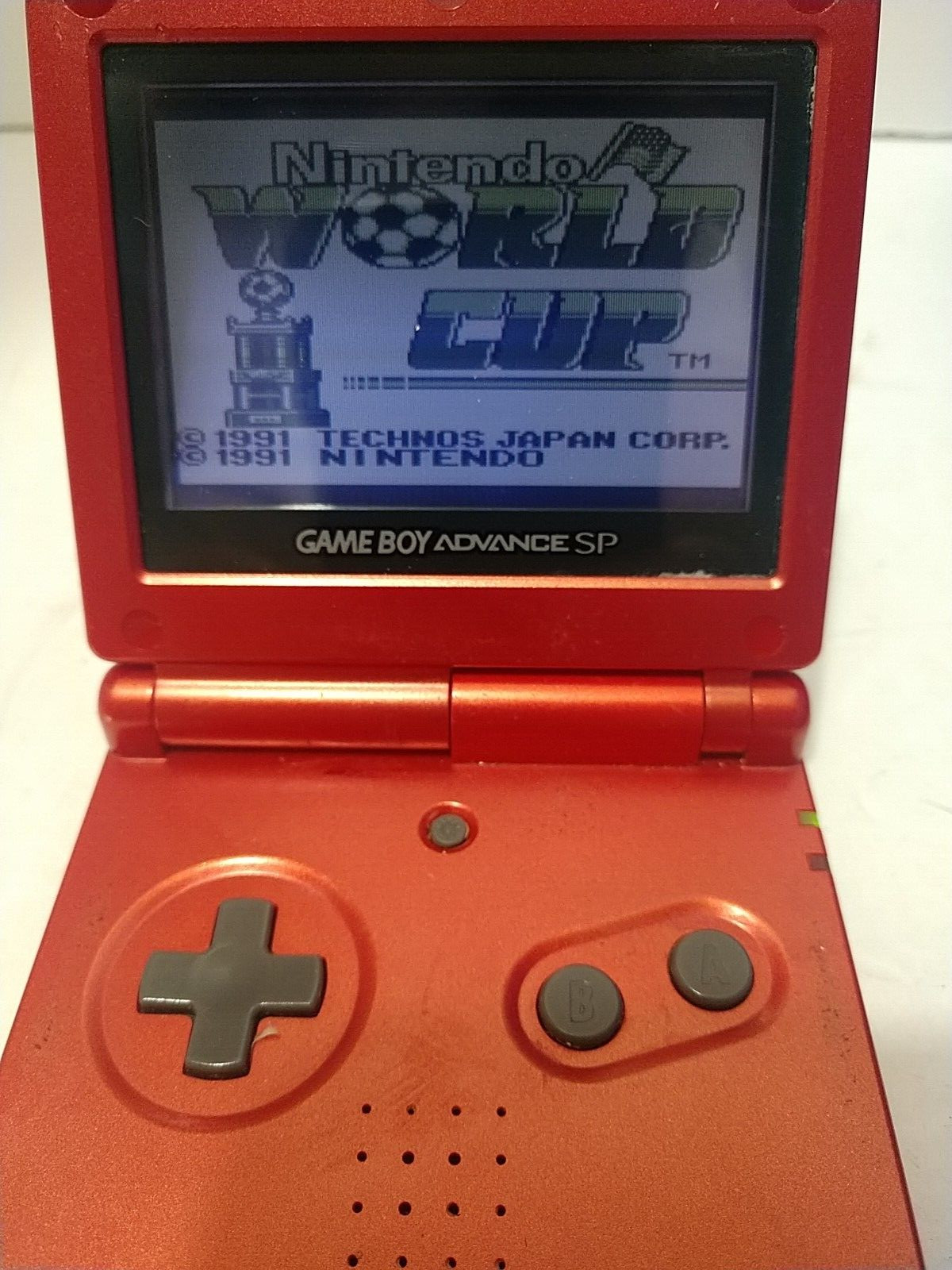 Nintendo Game Boy Advance SP AGS‑001 Red + Charger + World Cup – Tested Works