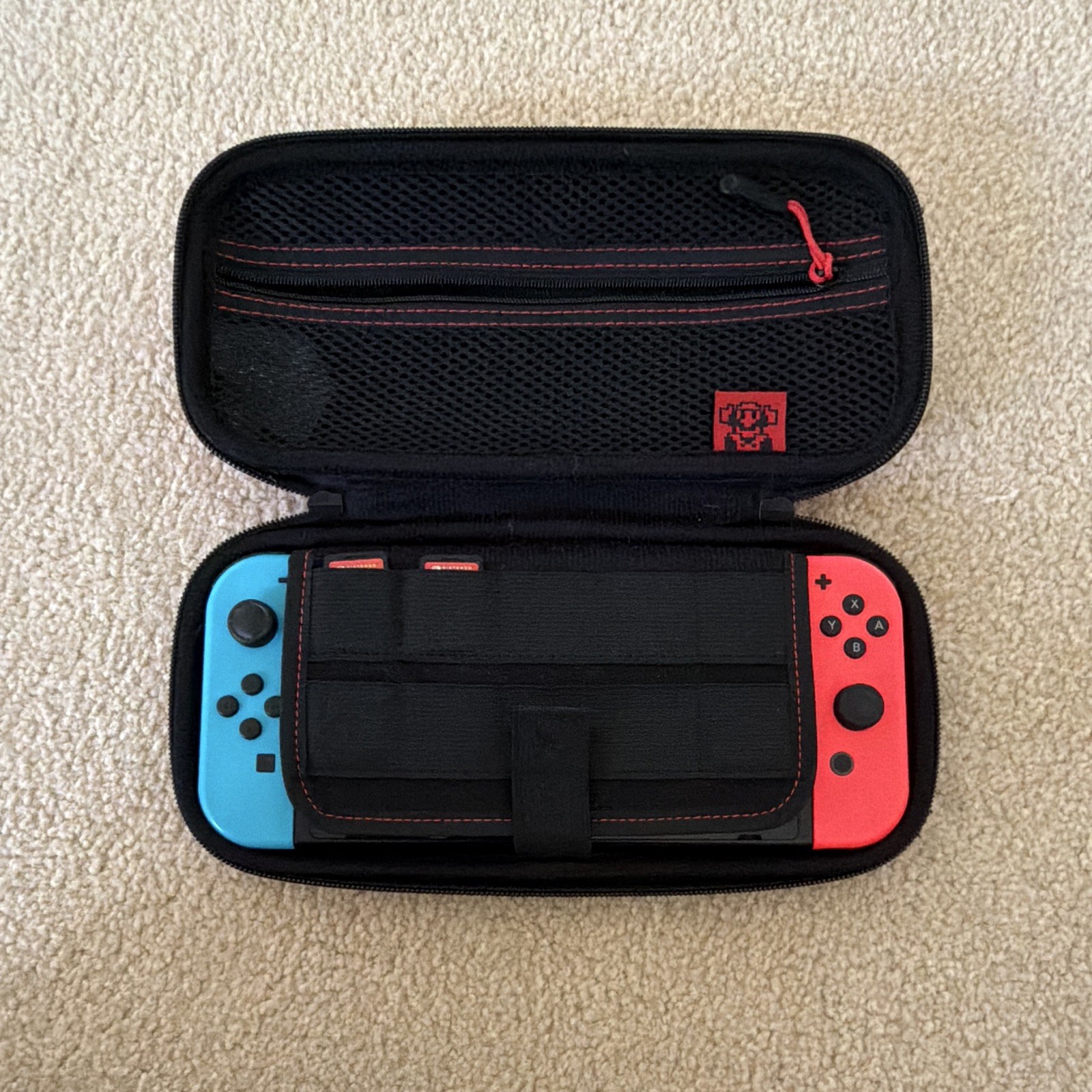 Nintendo Switch Console Neon Red/Blue w/ Smash Ultimate, Zelda BOTW & Case