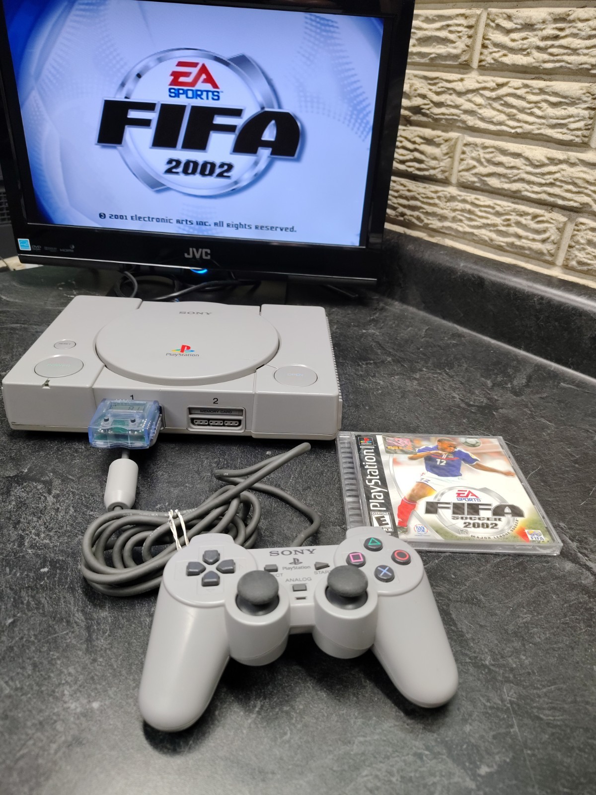 Sony PlayStation 1 SCPH-7501 W/ 2 Games 1 Controller Cables Mega Mem Card Tested