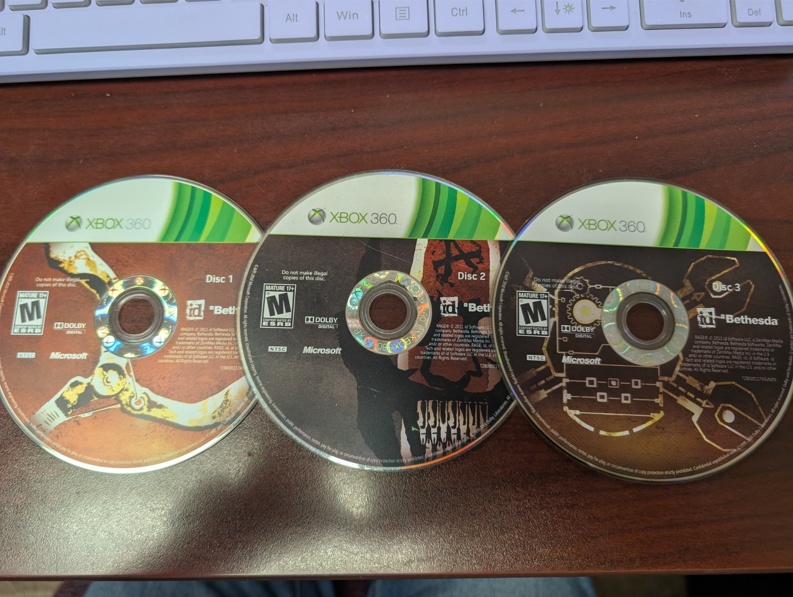 Rage (Microsoft Xbox 360) NO TRACKING – 3 DISCS ONLY 5033