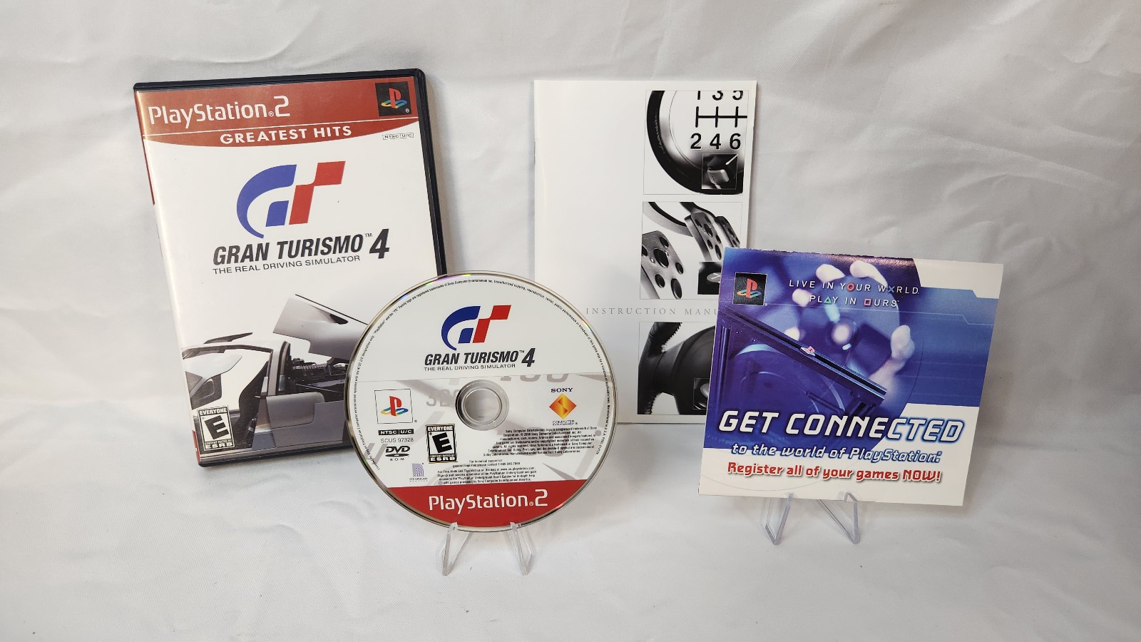 Gran Turismo 4 Complete with Manual and Registration Card, verified working