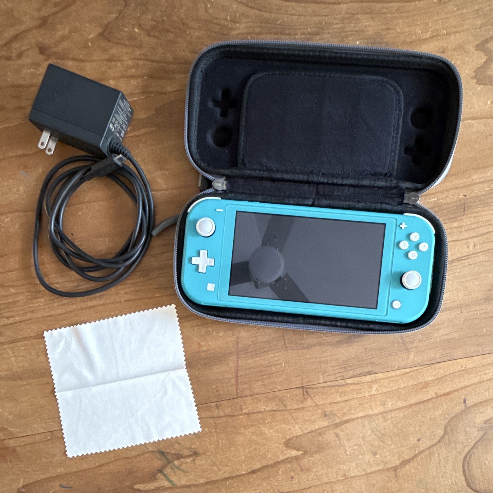 Nintendo Switch Lite Blue Bundle w/ Case, Charger, screen protectors, & stylus