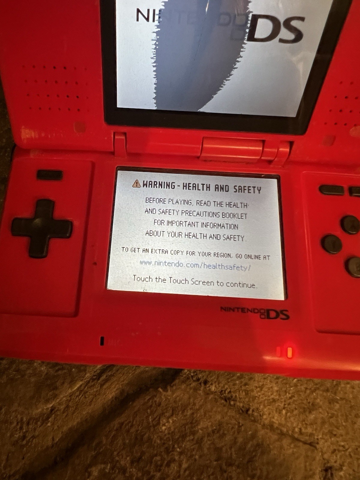 Nintendo DS NTR-001 Red Phat For Parts or Repair Powers On