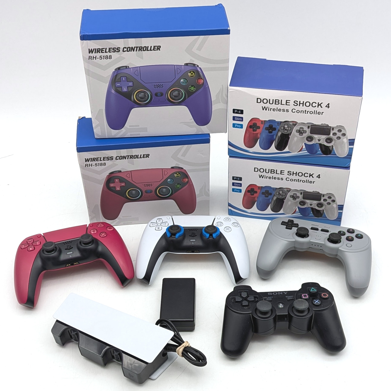 Assorted Wireless PlayStation Video Game Controllers & Charging Station Lot of 9