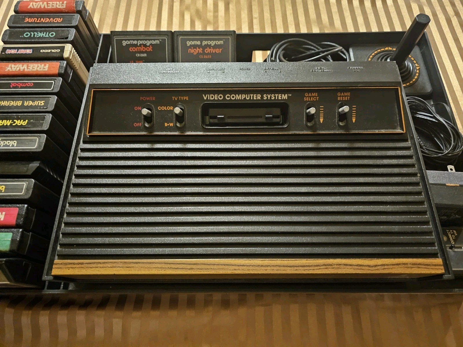 ATARI BUNDLE WITH SYSTEM, CONTROLLERS, CASE, GAMES, BOOKS, HOOKUPS CX-2600A