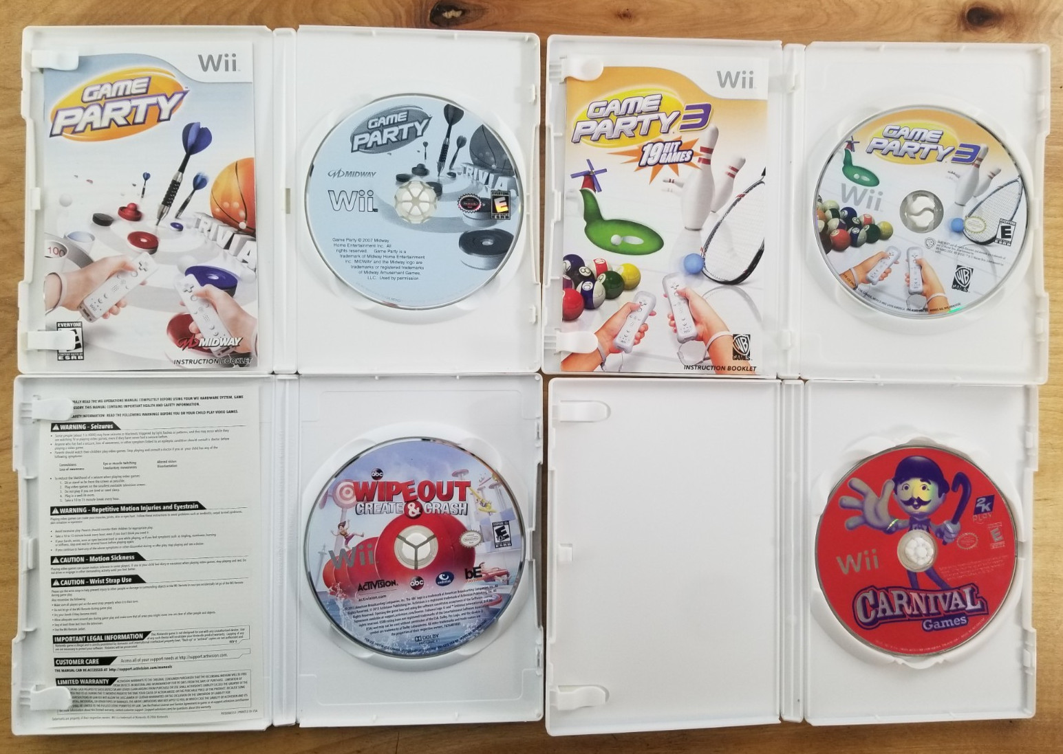 4x Nintendo Wii Bundle: Game Party 1-2, Carnival Games & Wipeout Create…
