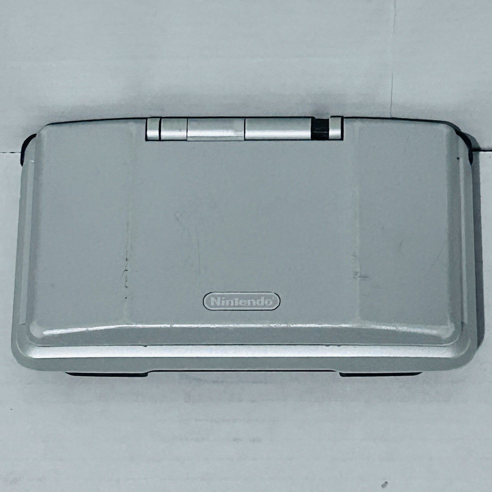 Nintendo DS NTR-001 Original Silver has Broken Hinge FOR PARTS OR REPAIR AS-IS