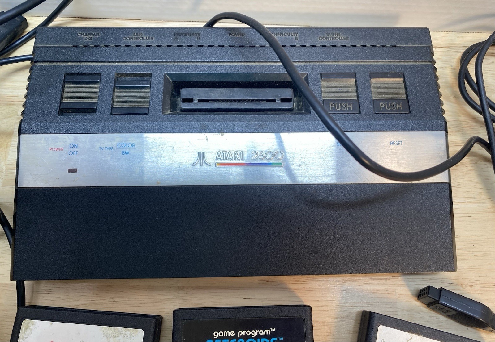 Atari 2600 Console with Games Asteroids ET Raiders of the Lost Ark