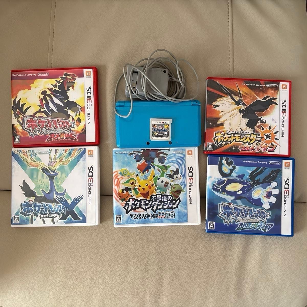 Lot of 8 Nintendo 3DS Console Light Blue Charger Pokemon 6 Game Alpha Sapphire