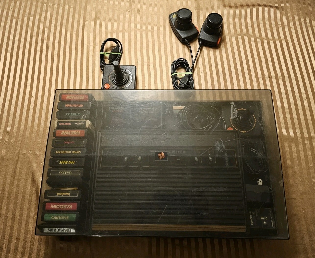 ATARI BUNDLE WITH SYSTEM, CONTROLLERS, CASE, GAMES, BOOKS, HOOKUPS CX-2600A
