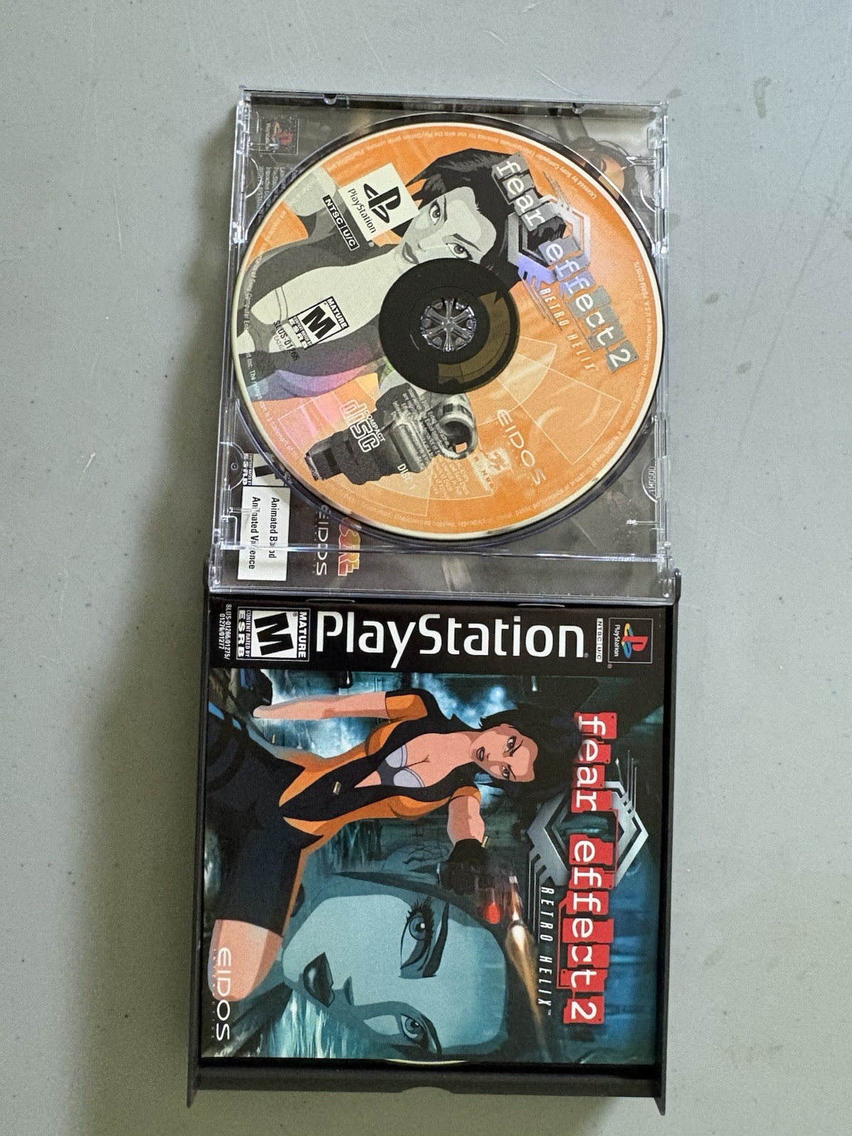 Eidos Fear Effect 2: Retro Helix (Sony PlayStation 1) CIB M Mature