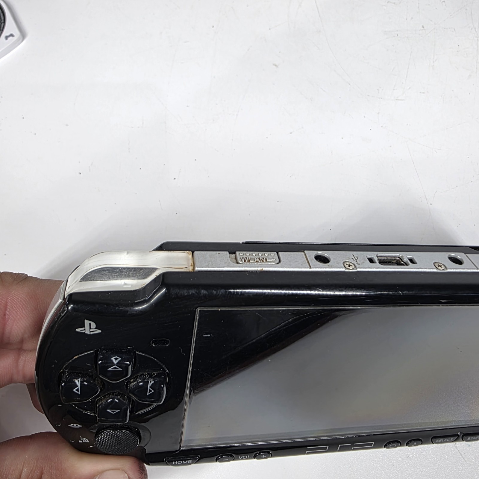 Sony PSP-2001 Slim Edition Black w/ Charger & Need For Speed Carbon – No Battery