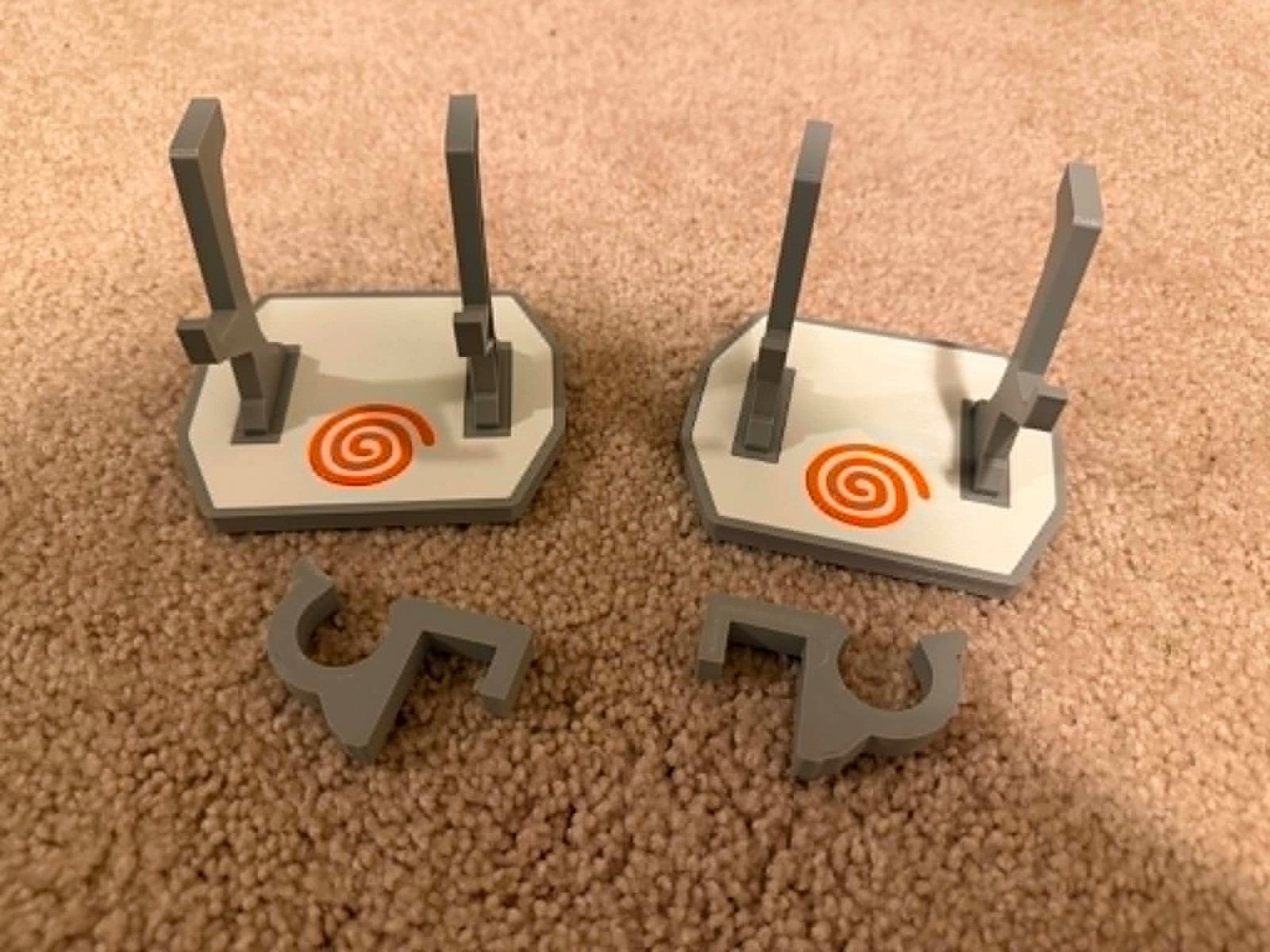 Sega Dreamcast Controller Display Stands 3D Printed Pair Gray White Orange Swirl
