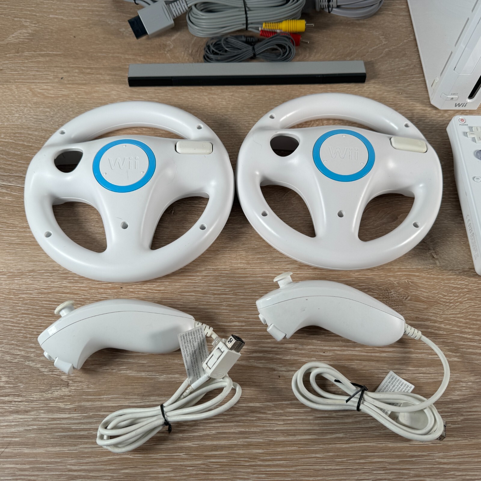 Nintendo Wii Console Mario Kart Bundle with Wii Sports, 2 Controllers & 2 Wheels