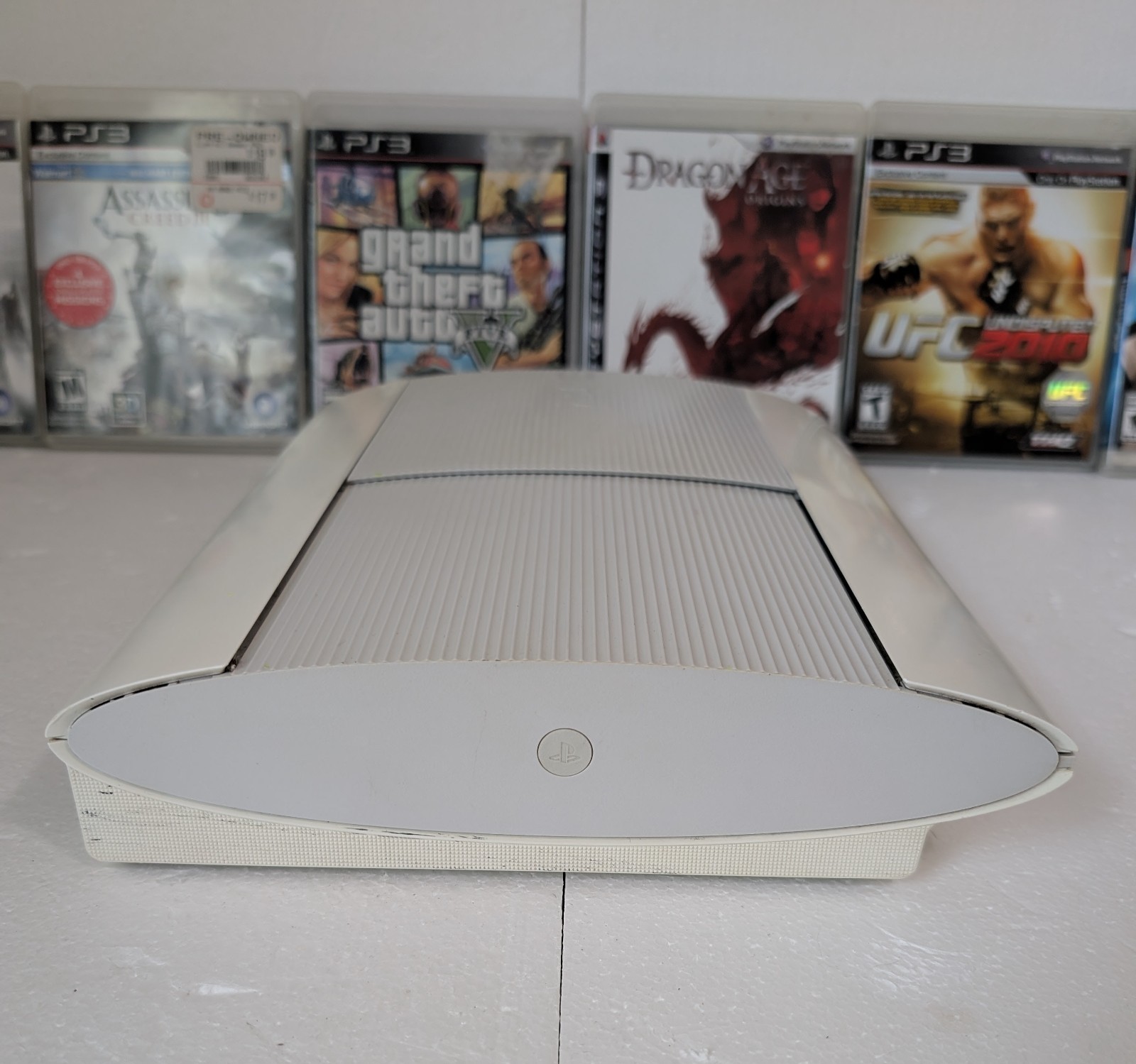 Sony PS3 Super Slim 500GB White Console Bundle 2 OEM Sony Controllers 8 Games…