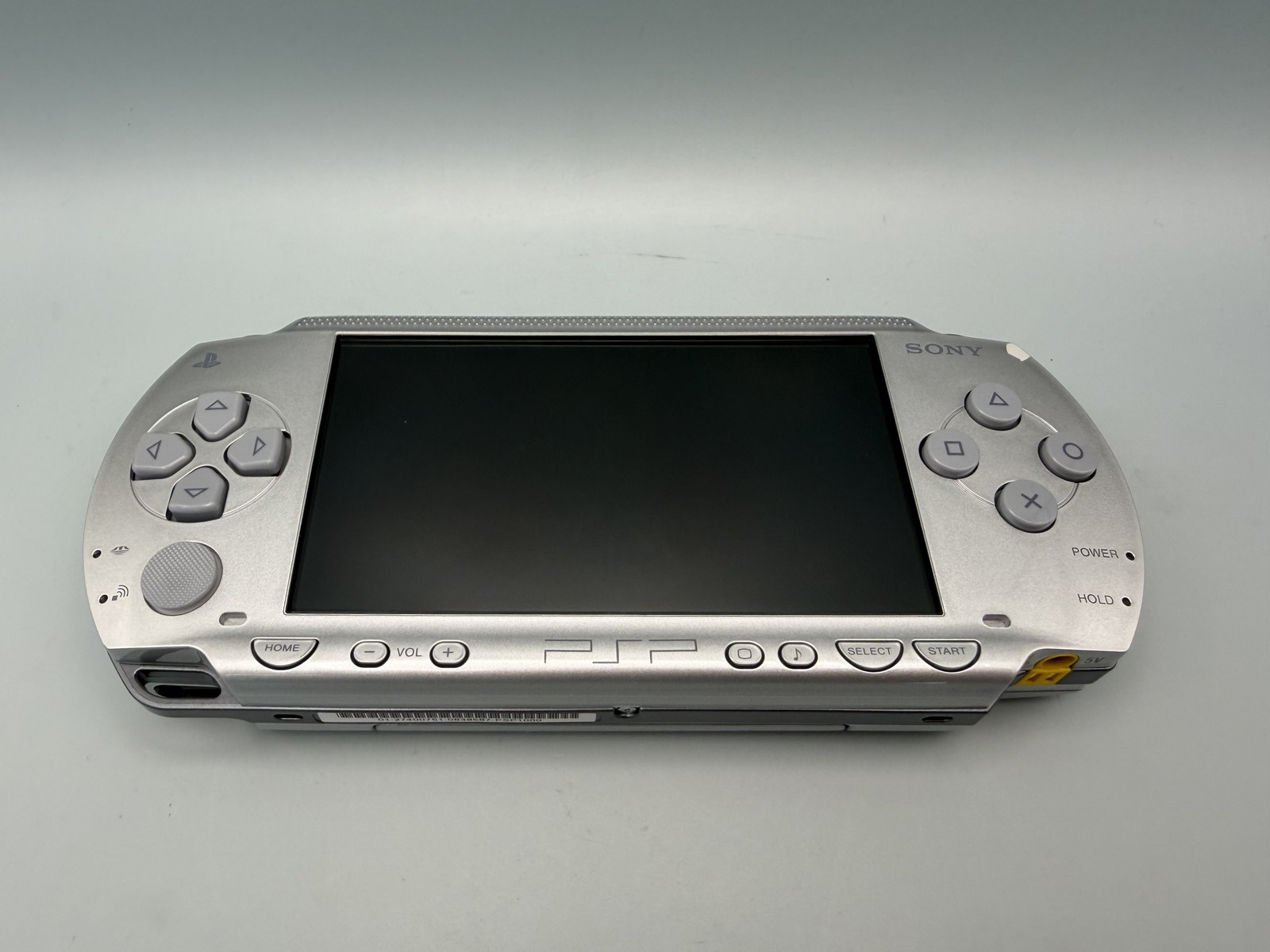 Sony PSP 1000 Silver Handheld Console – Tested Working + New Battery & Charger