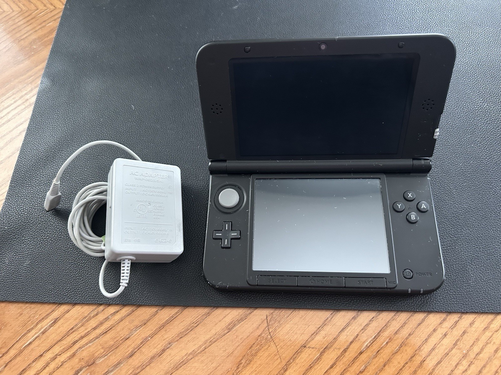 Nintendo 3DS XL Red/Black Console w/ AC Adapter + Pokémon Sun Game NTSC-U/C