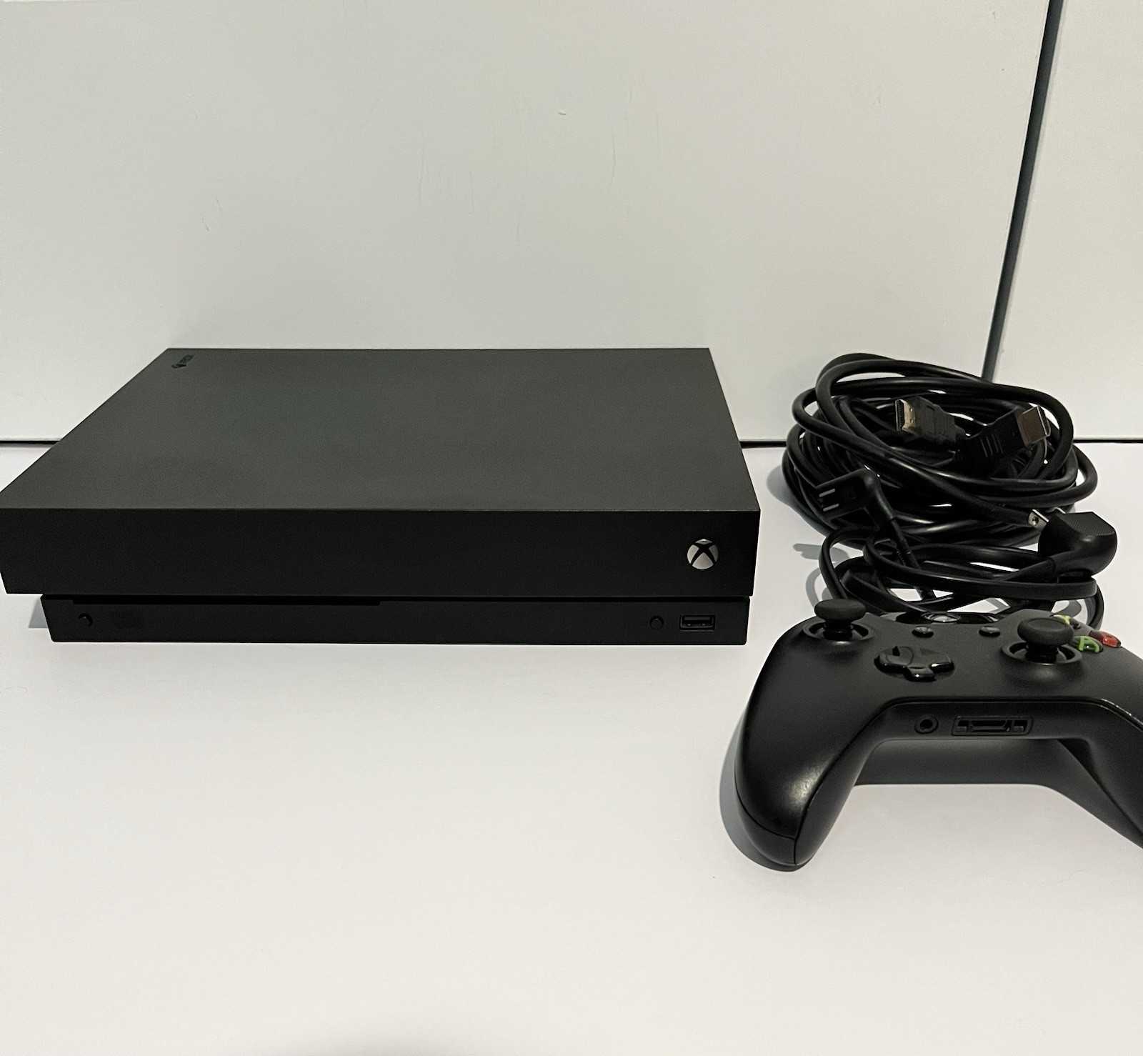 Microsoft Xbox One X 1TB Black – Includes Games, Controller, and Cables