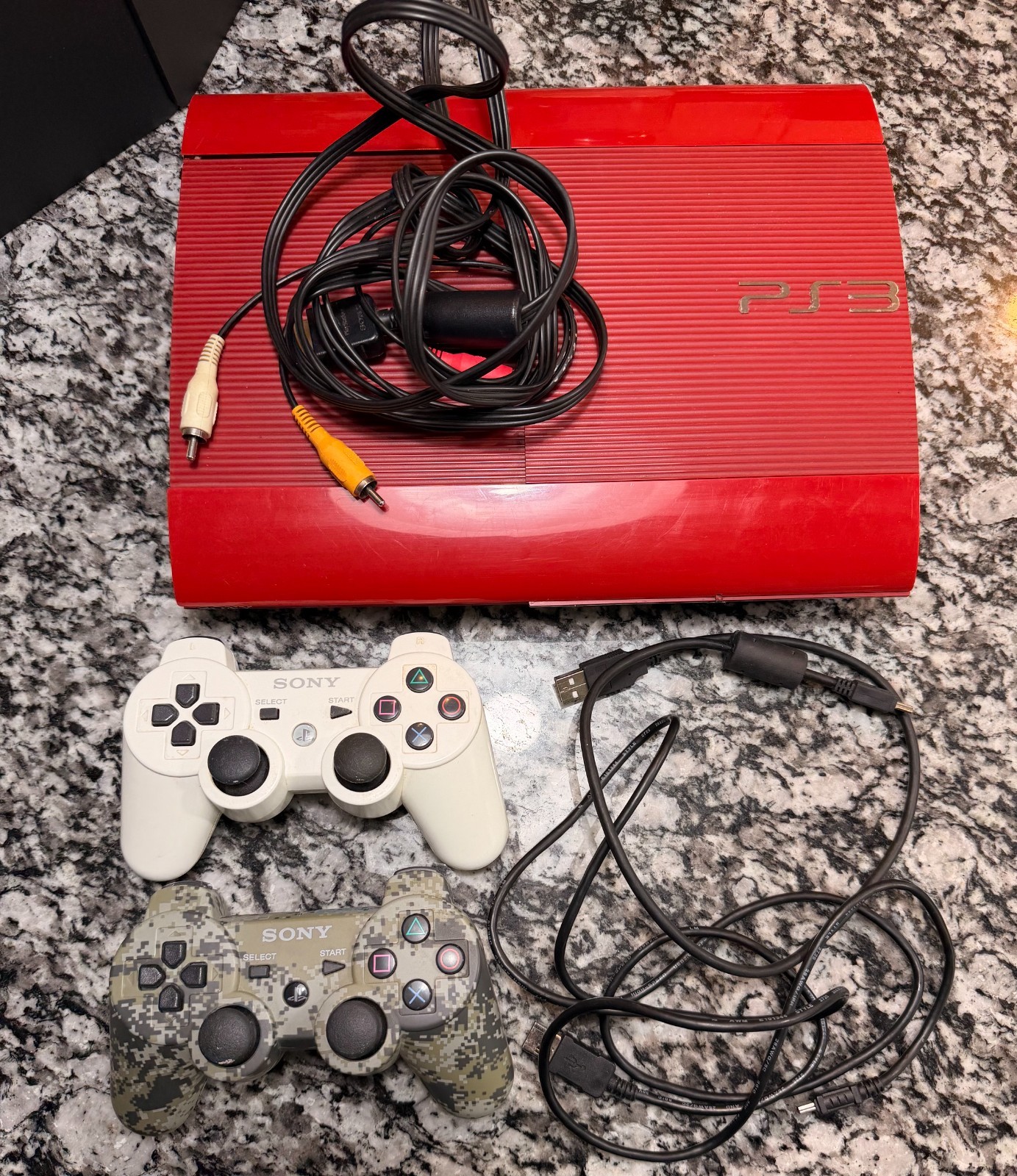 Sony PlayStation 3 Slim 500GB Garnet Red Edition Console with controllers