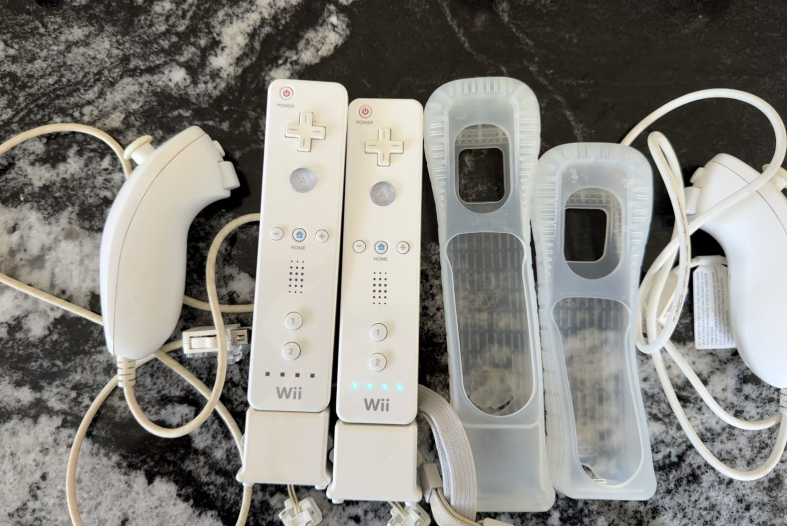 Nintendo Wii White Remote with Motion Plus Adapter and Sleeve and Nunchuck x2