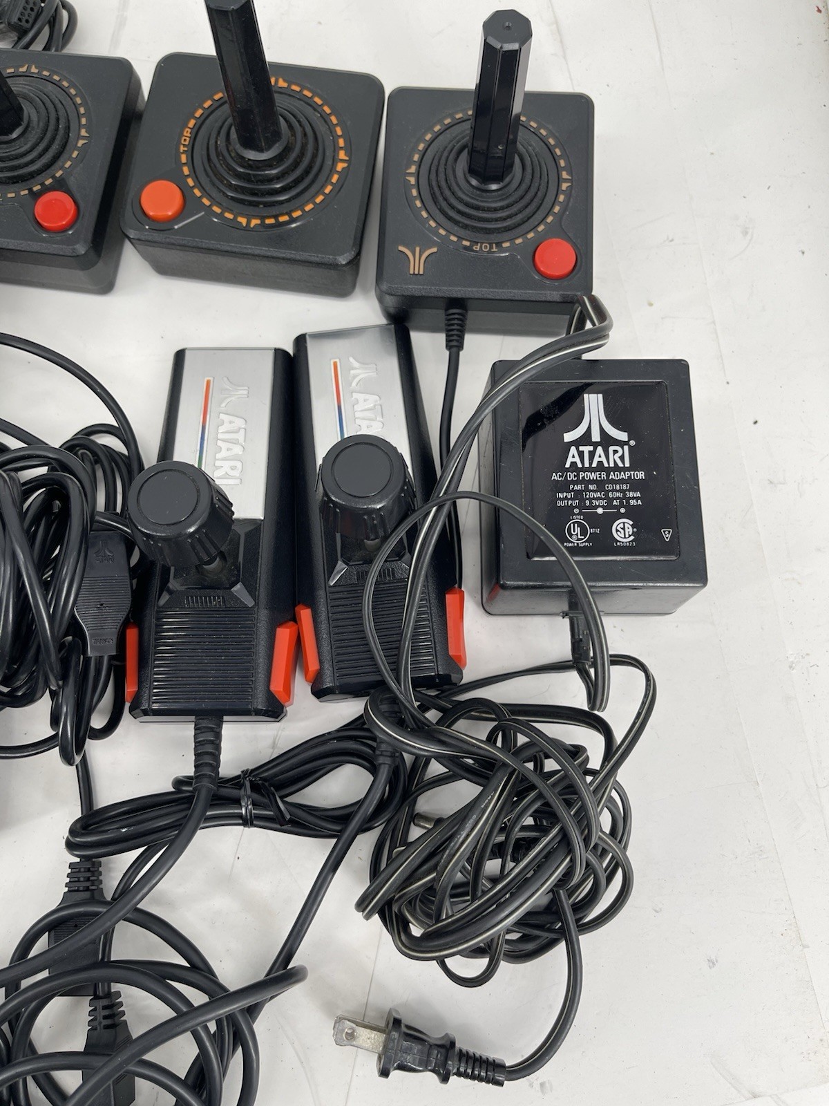 Huge Bulk Lot 15 Atari 2600 Controllers Joysticks Paddles, Adapter & Games