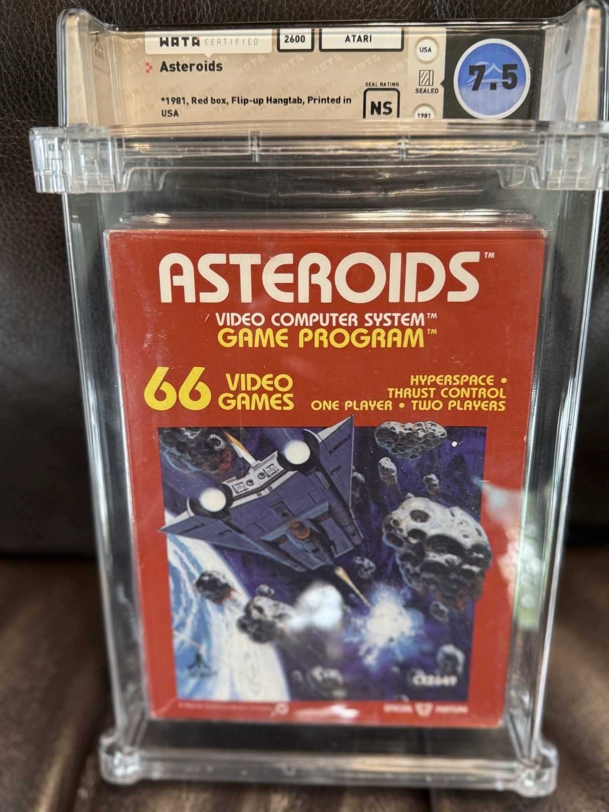 Atari 2600 Asteroids (1981 Red Box Hangtab) WATA 7.5 Sealed – Rare Early Print