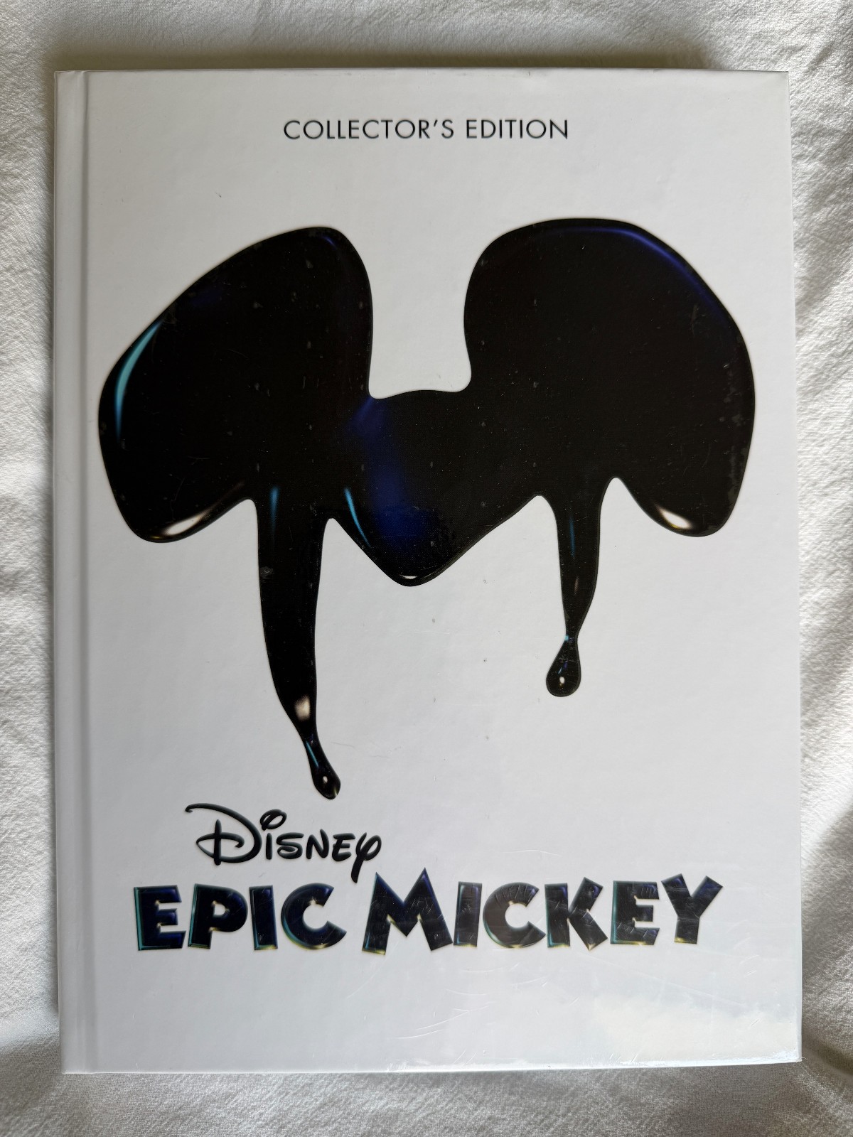 Disney Epic Mickey Collector’s Edition Strategy Guide Hardcover & Art Cell – NEW