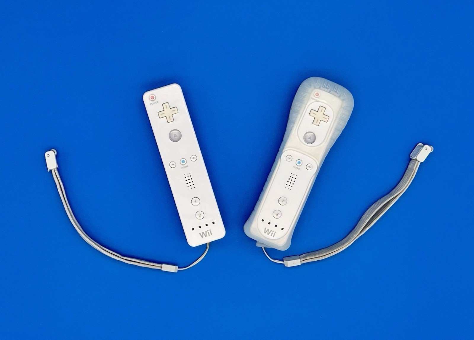 “Not Working”- Nintendo Wii White Remotes (2) with Straps & Sports Attachments