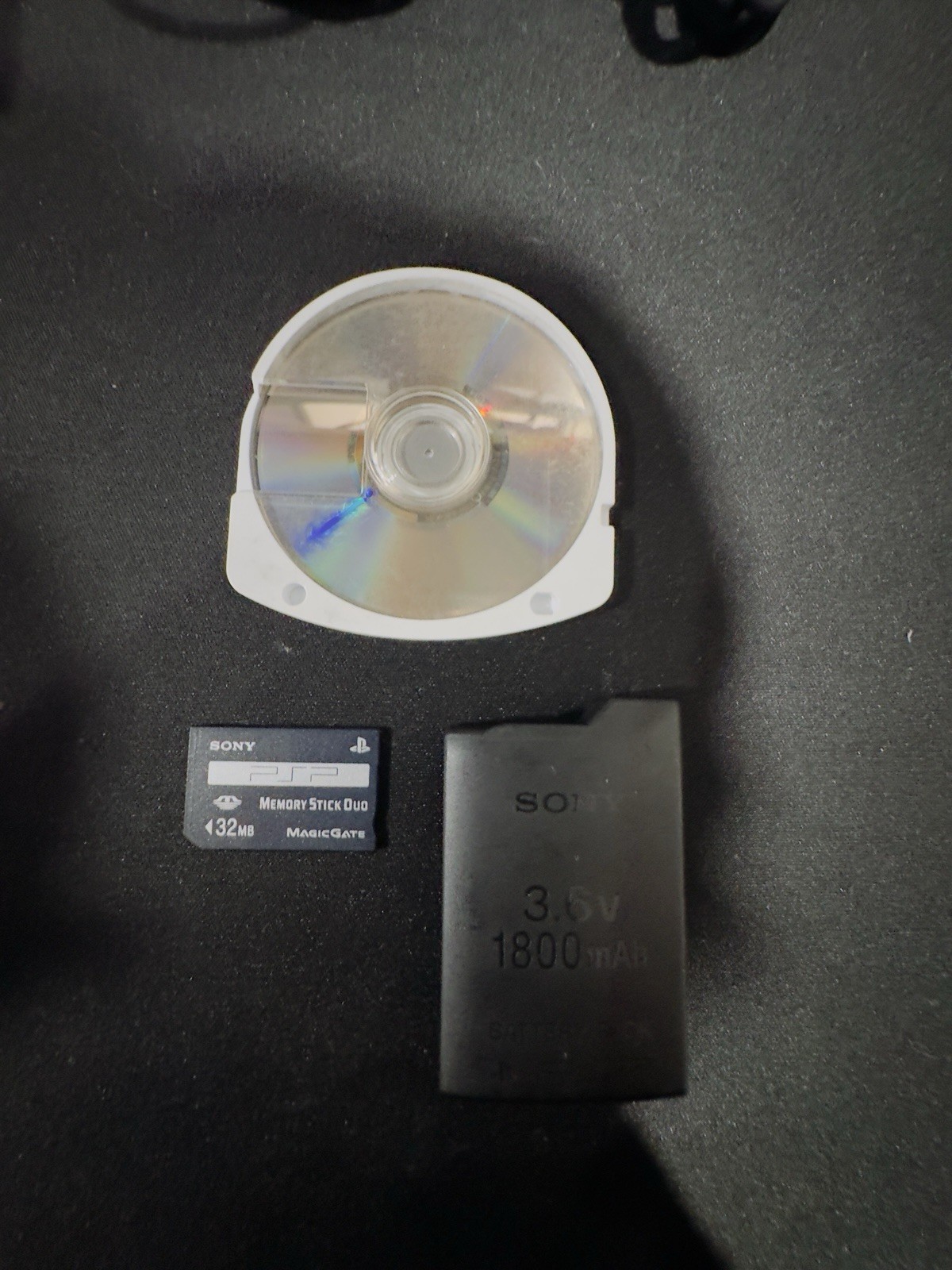 Sony PSP-1001 Black Console & 8 Games Bundle
