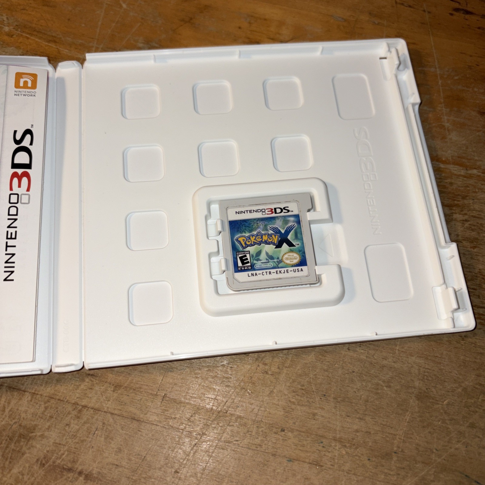 Pokemon X Nintendo 3DS used in case with inserts