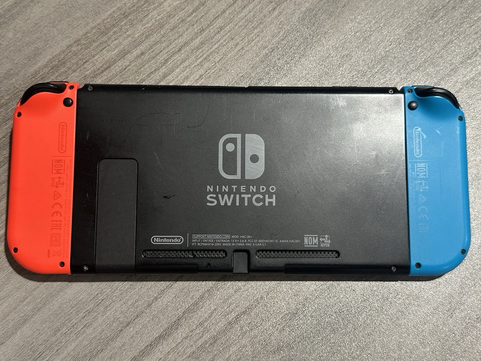 Nintendo Switch Handheld Video Game Console w/ Neon Blue & Red Joy-Con HAC-001