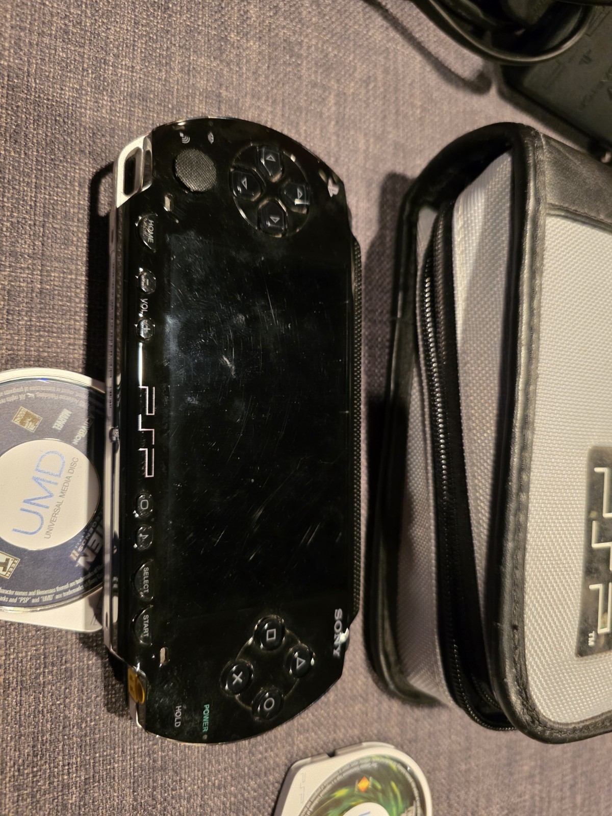 Sony PSP-1001 Black, Oem Charger, 5 Games – Darkstalkers, Xmen, Twisted Metal