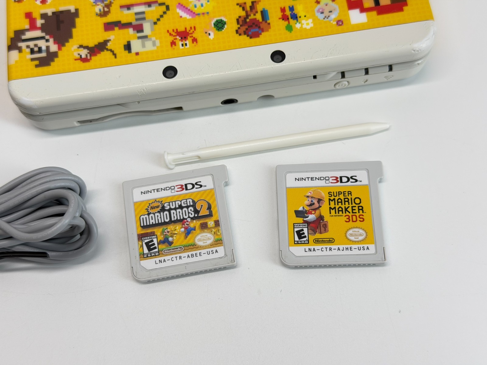 New Nintendo 3DS Handheld System Mario Edition Bundle w/Mario Bros 2 & Maker