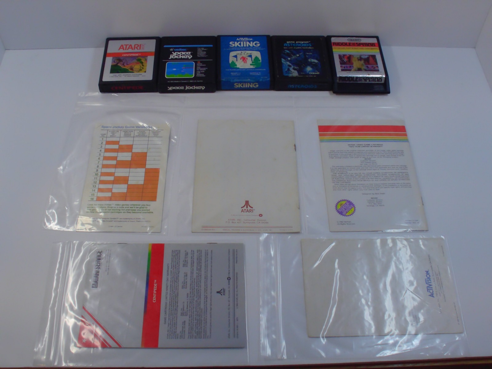 Atari 2600 Lot of 10 Games w Manuals Centripede River Raid Asteroids TESTED RP